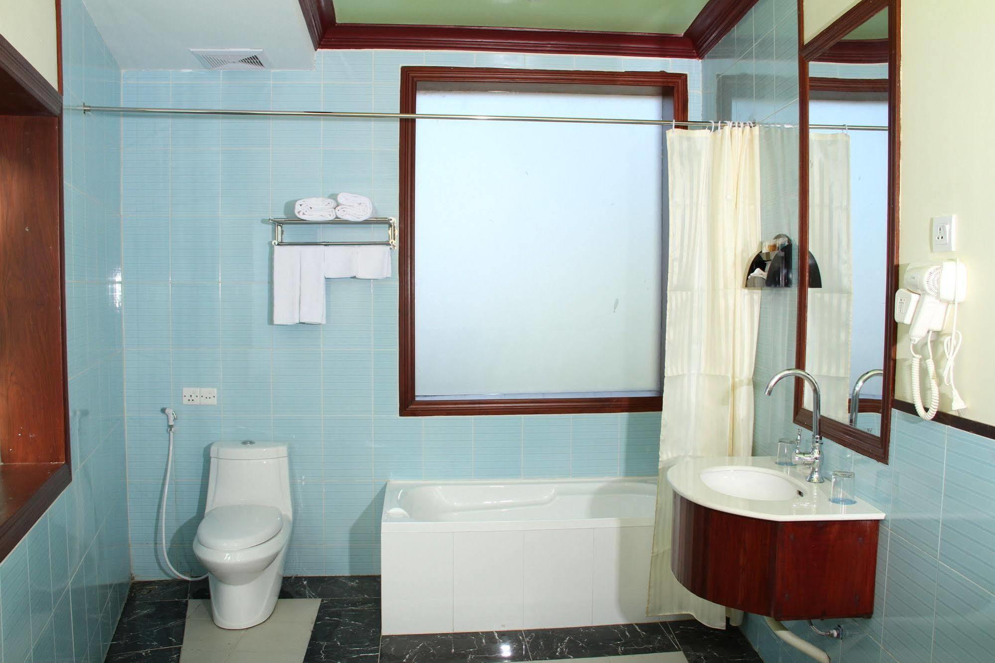 Sky Man Hotel Gyogon Bagian luar foto